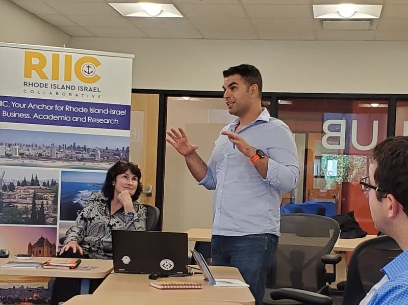 Itamar Assaf speaking at an RIIC event on Rhode Island–Israel R&D partnerships